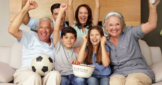 Excited Multigenerational Family Watching Sports at Home - Download Free Stock Images Pikwizard.com