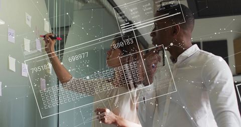 Young Professionals Collaborating on Digital Transformation with Data