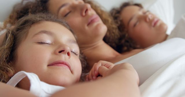 Mother and children sleeping in bedroom - Download Free Stock Photos Pikwizard.com