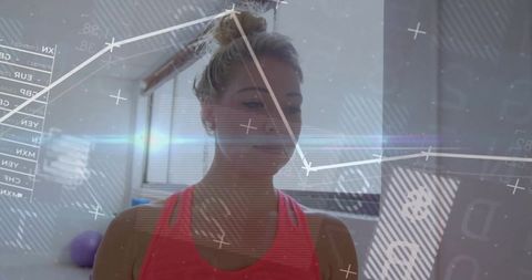 Fitness instructor analyzing health data with digital overlay