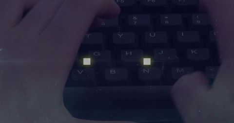 Typing on Desaturated Keyboard with Glowing Yellow Key Indicators and Minimalist Retro Grain