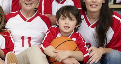 Family Enjoying Basketball Together at Home