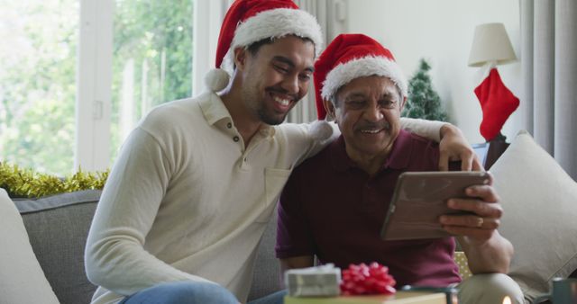 Father and Son Celebrating Virtual Christmas with Video Call - Download Free Stock Images Pikwizard.com