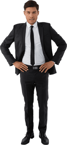 Confident young businessman standing with hands on hips, transparent