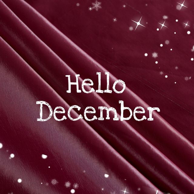 Composition of hello december text over snow falling. Christmas, winter and celebration concept digitally generated video.