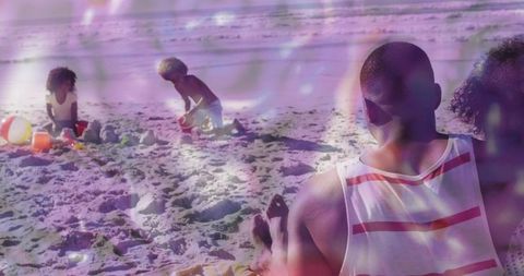 Man supervising kids building sandcastles on sunlit beach with purple overlay