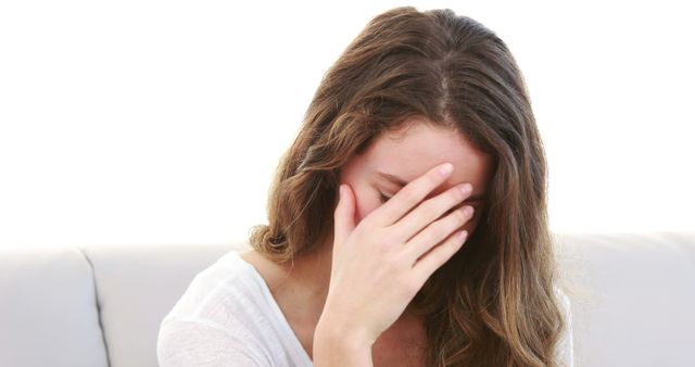 Sad Young Woman Covering Face and Crying - Download Free Stock Images Pikwizard.com