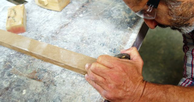 Craftsman Working with Wooden Plank in Workshop - Download Free Stock Images Pikwizard.com