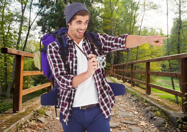 Ideal for conveying themes of adventure and nature exploration. Perfect for travel blogs, outdoor activity promotions, or advertisements for hiking gear. Features a young man with a look of excitement, capturing a scenic moment while hiking.
