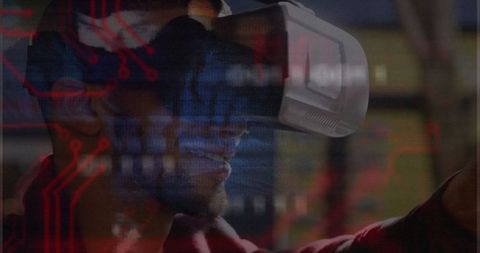 Person Engaging with VR Headset in High-Tech Environment