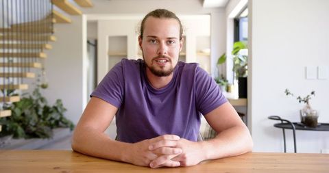 Confident Man Engaging in Video Call at Home