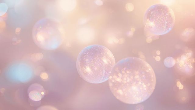 Glittering pastel bubbles floating in dreamy pearlescent bokeh and ethereal sparkle glow
