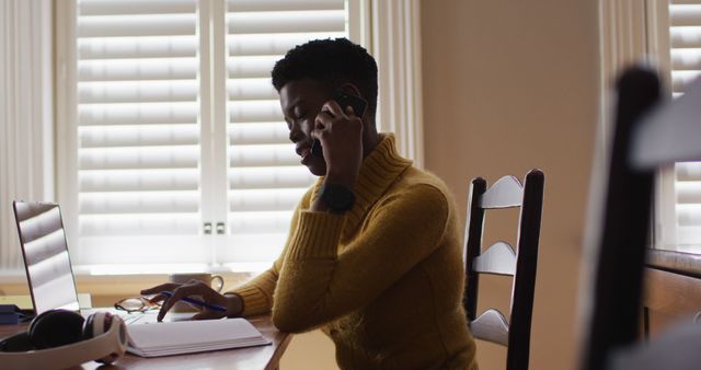 Woman Working From Home on Phone with Notebook and Laptop - Download Free Stock Images Pikwizard.com