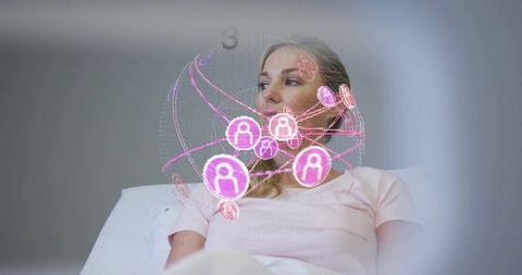 Mature woman reclining with holographic network globe projecting digital connectivity