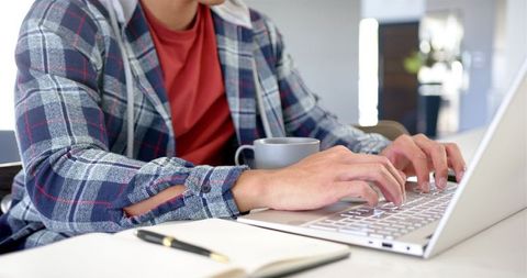 Remote Worker Using Laptop at Cozy Home Office Setup - Download Free Stock Images Pikwizard.com