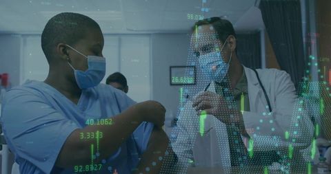 Doctor and nurse in medical clinic with data graphics overlay