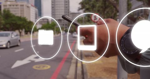 Hand Interacting With Digital Icons in Urban Environment