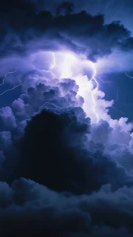 Vertical Night Lightning Footage Capturing Forking Bolt Illuminating Turbulent Storm Clouds