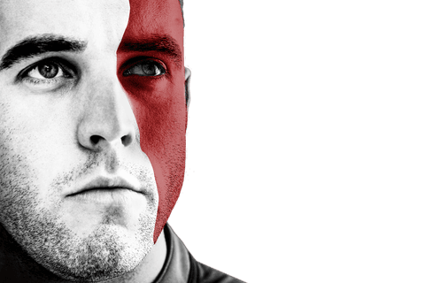 Pensive man with divided white and red painted face on transparent background