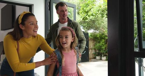 Happy Family Returning Home from Vacation