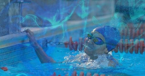 Competitive Swimmer Finishing Lap in Pool