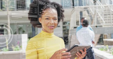 Businesswoman Using Tablet with Global Data Interface