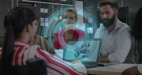 Team Collaboration with Futuristic Technology in Modern Office