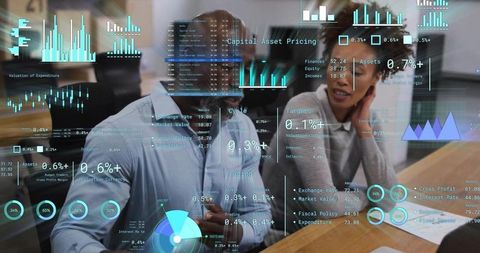 Business professionals collaborating over augmented reality financial dashboards and charts