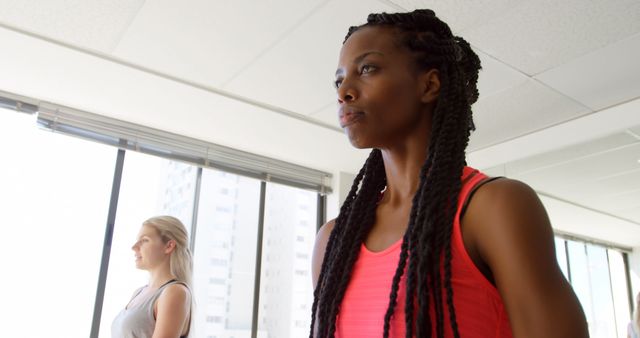 Women Engaging in Focused Yoga Session in Bright Studio - Download Free Stock Images Pikwizard.com