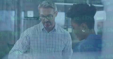 Collaboration in Diverse Office with Financial Data Projections - Download Free Stock Images Pikwizard.com