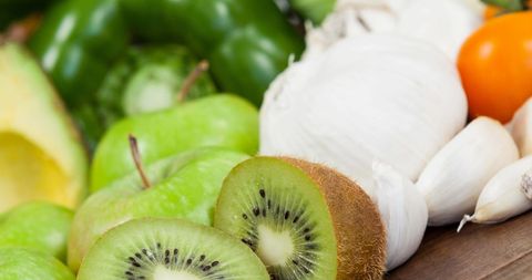 Fresh Organic Produce Featuring Kiwis and Peppers - Download Free Stock Images Pikwizard.com