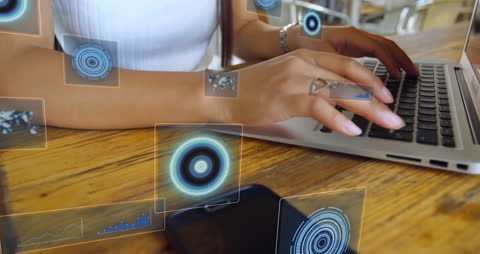 Businesswoman Analyzing Data with Laptop Technology Interface