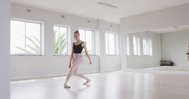 Ballet Dancer Practicing in Bright Studio with Large Windows - Download Free Stock Images Pikwizard.com