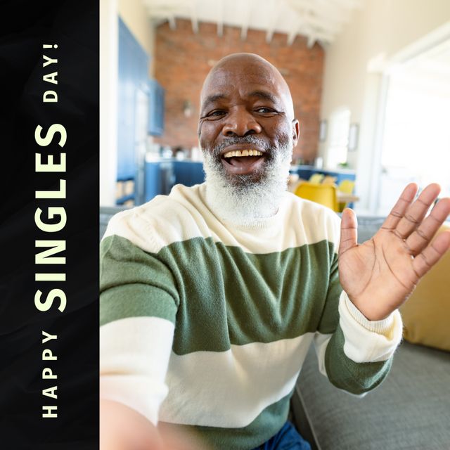 Happy singles day text and african american senior man waving hand and taking selfie at home. Digital composite, retirement, bald, smiling, awareness, holiday, love and celebration concept.
