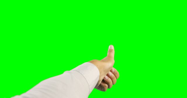 This image features a hand giving a thumbs up gesture against a bright green screen background. Ideal for using in projects that highlight approval, success, or positivity. The green screen makes it easy for the thumb to be further edited or replaced in various media projects, suitable for marketing, presentations, social media posts, and promotional materials.