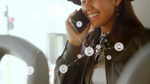 Woman Talking on Phone in Bus with Music Technology Overlay