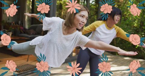 Women Practicing Yoga Amidst Floral Accents in Nature