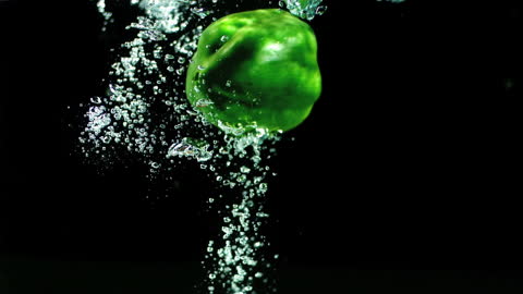Green Bell Pepper Splashes Dramatically in Water