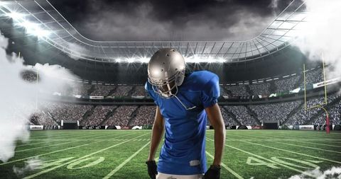 Focused Football Player in Stadium with Intense Atmosphere