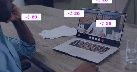 Virtual Meeting Engagement Annotated with Share Icons on Laptop Screen