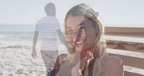 Double Exposure of Smiling Woman with Man on Sunny Beach