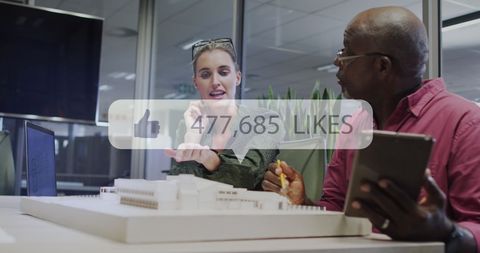 Digital Overlay of Like Counter with Business Professionals in Office