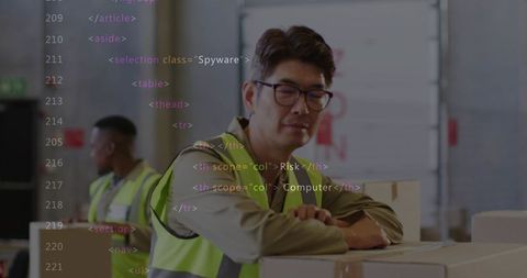 Leaning mature korean warehouse worker wearing hi-vis vest inspecting boxes with code overlay