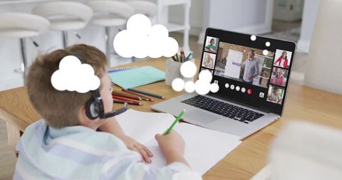 Child attending online class with headset at home