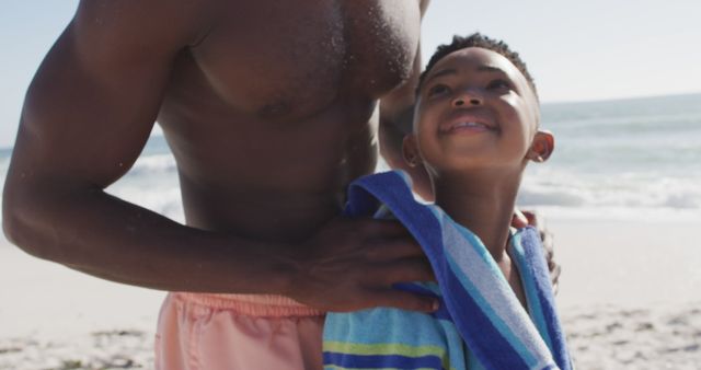 Father and Son Enjoying Sunny Beach Day Together - Download Free Stock Images Pikwizard.com