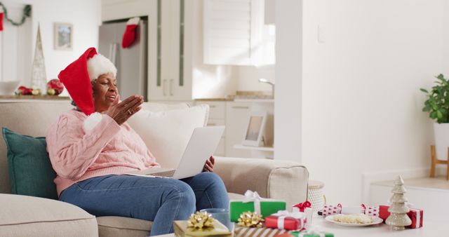 Elderly Woman Having Holiday Video Call On Laptop At Home - Download Free Stock Images Pikwizard.com