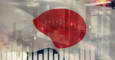 Financial charts superimposed on flags of japan illustrating global markets