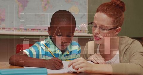 Child tutoring session with teacher guidance in classroom