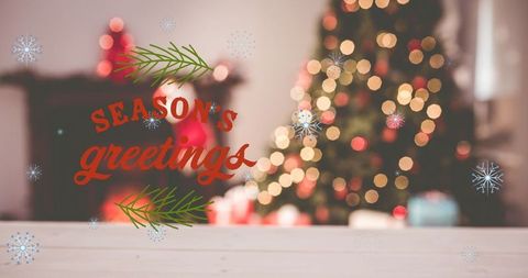 Warm Christmas Scene with Season's Greetings Overlay