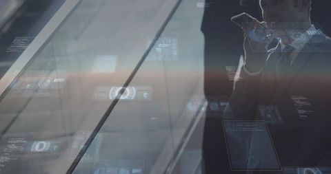 Executive speaking on smartphone beside slanted glass tower with holographic ui overlays